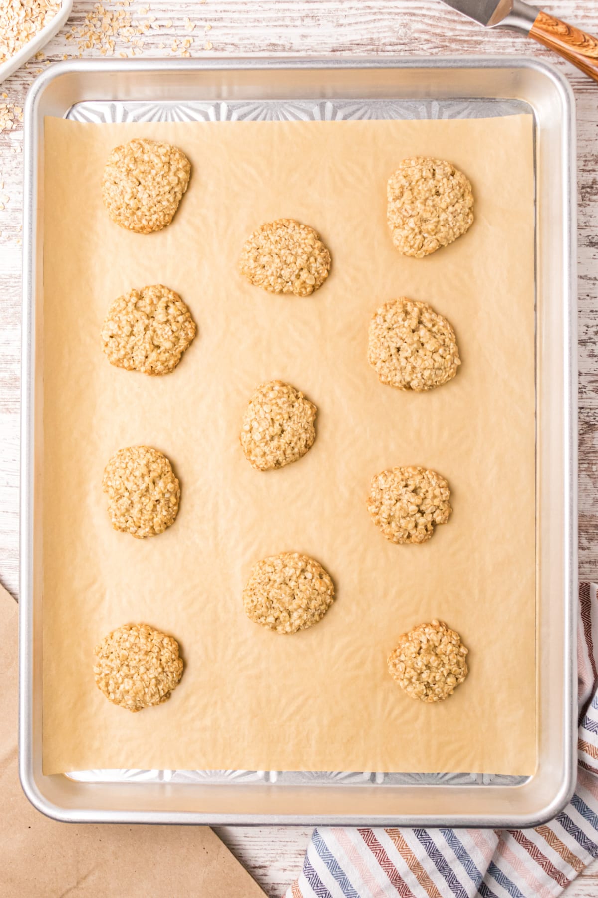 oatmeal cookies just out of oven on baking sheet