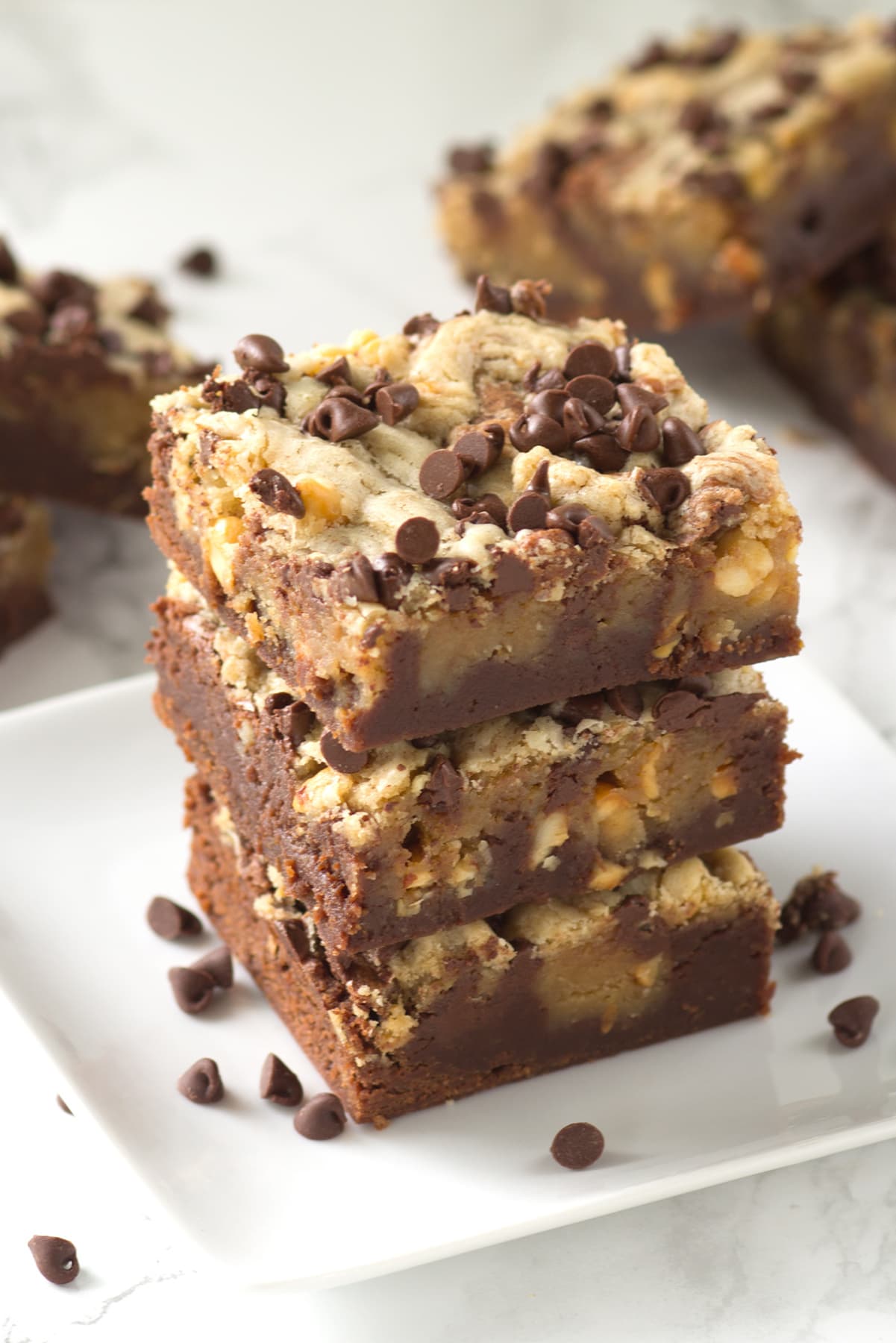 three peanut butter swirl brownies stacked