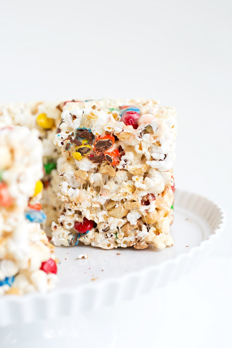 Popcorn Cake recipe from RecipeGirl.com #popcorn #cake #recipe #RecipeGirl Serving Popcorn Cake