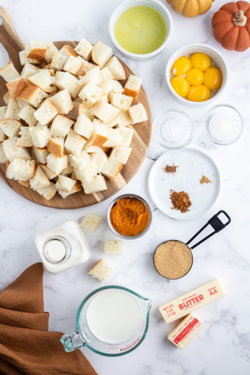 ingredients displayed for making pumpkin bread pudding