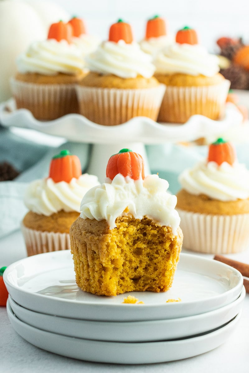 pumpkin cupcake with bite taken out of it