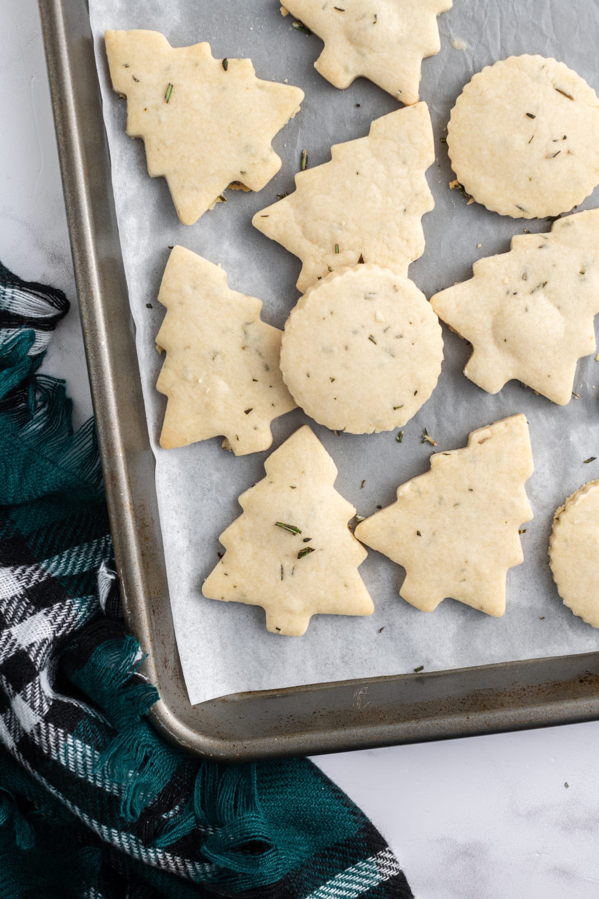 rosemary shortbread cookies on a baking sheet