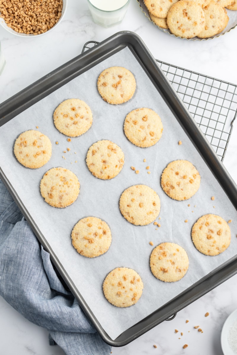 sparkling butter toffee cookies on a baking sheet
