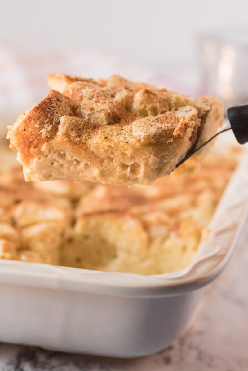 spatula serving slice of bread pudding