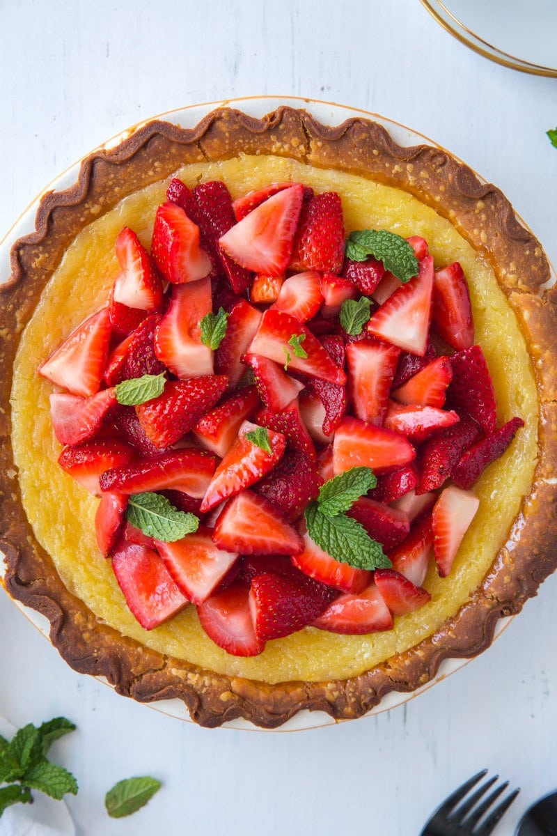 Overhead shot of Strawberry Lemon Buttermilk Pie garnished with fresh mint