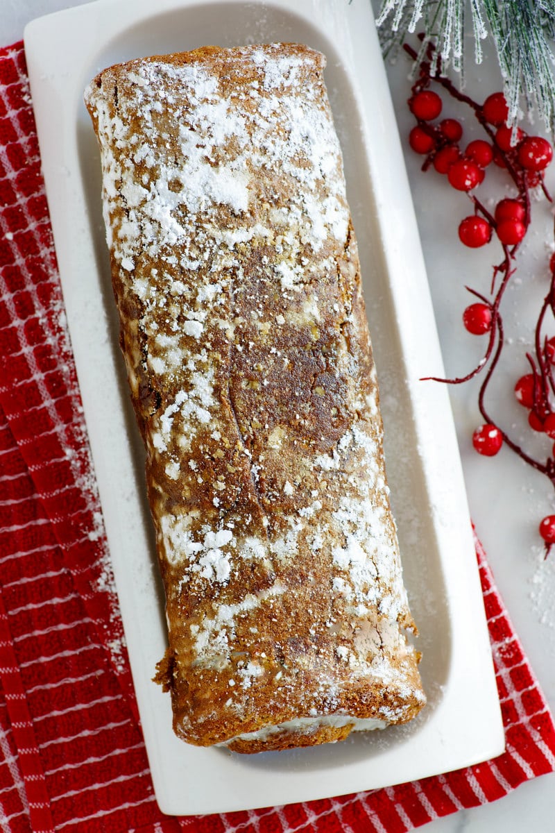 gingerbread ice cream roll on a white serving platter