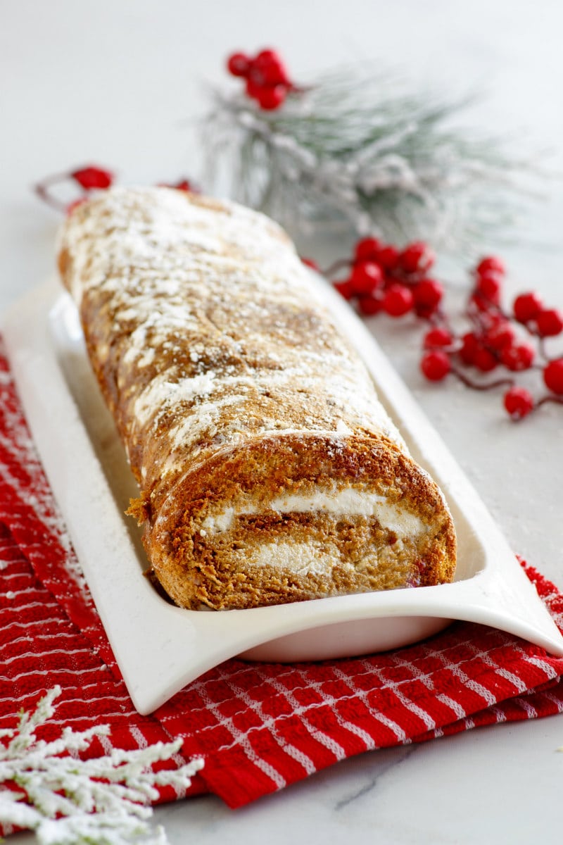 gingerbread ice cream roll on a white serving platter