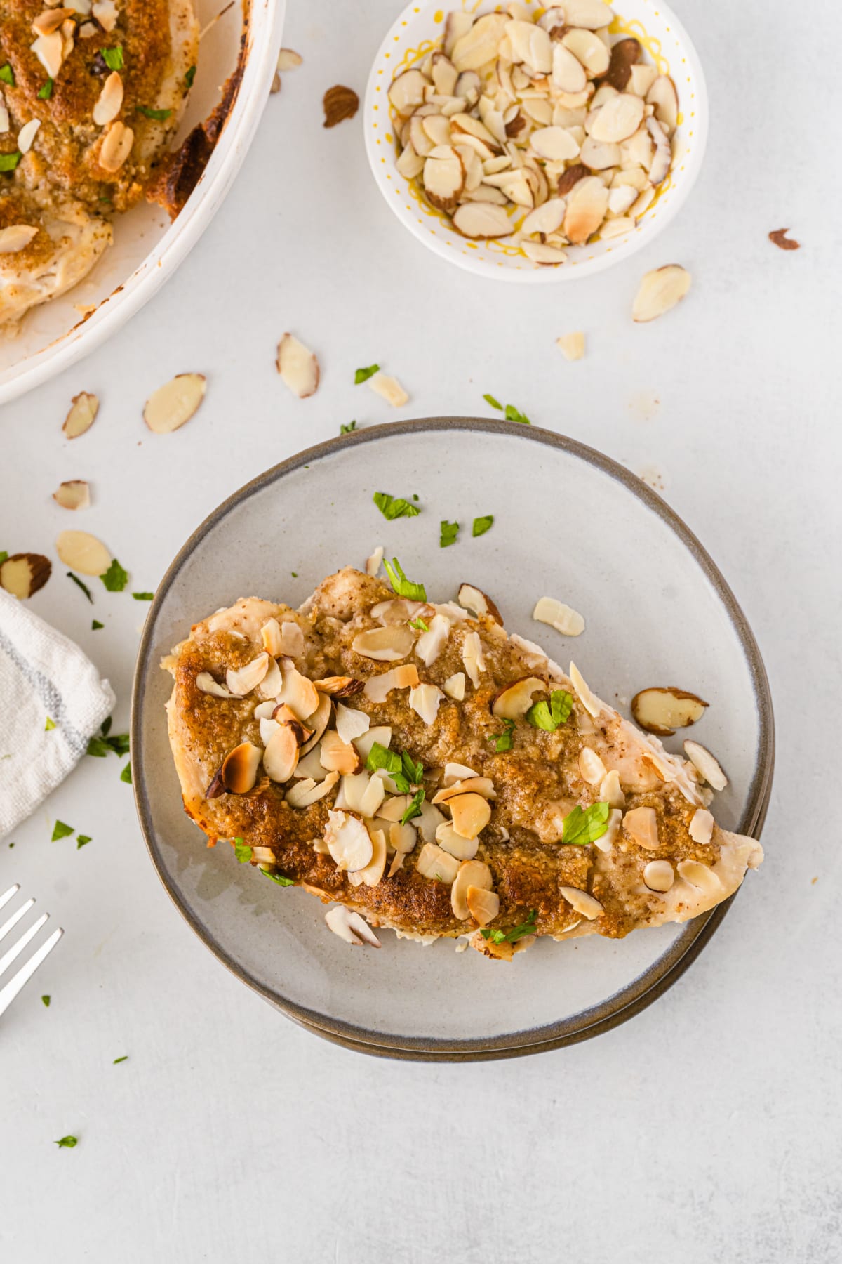 chicken with almond butter on plate