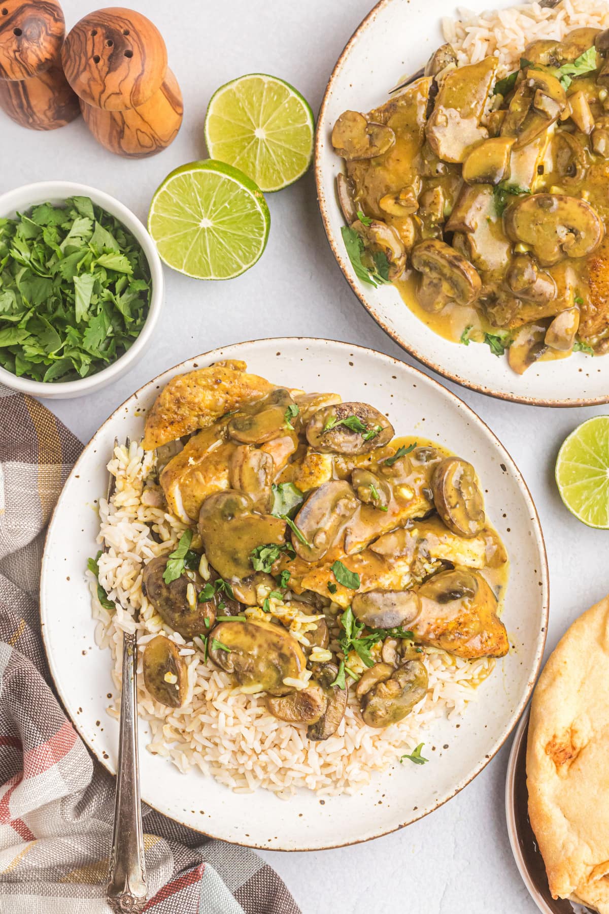 two amaretto chicken with rice plated