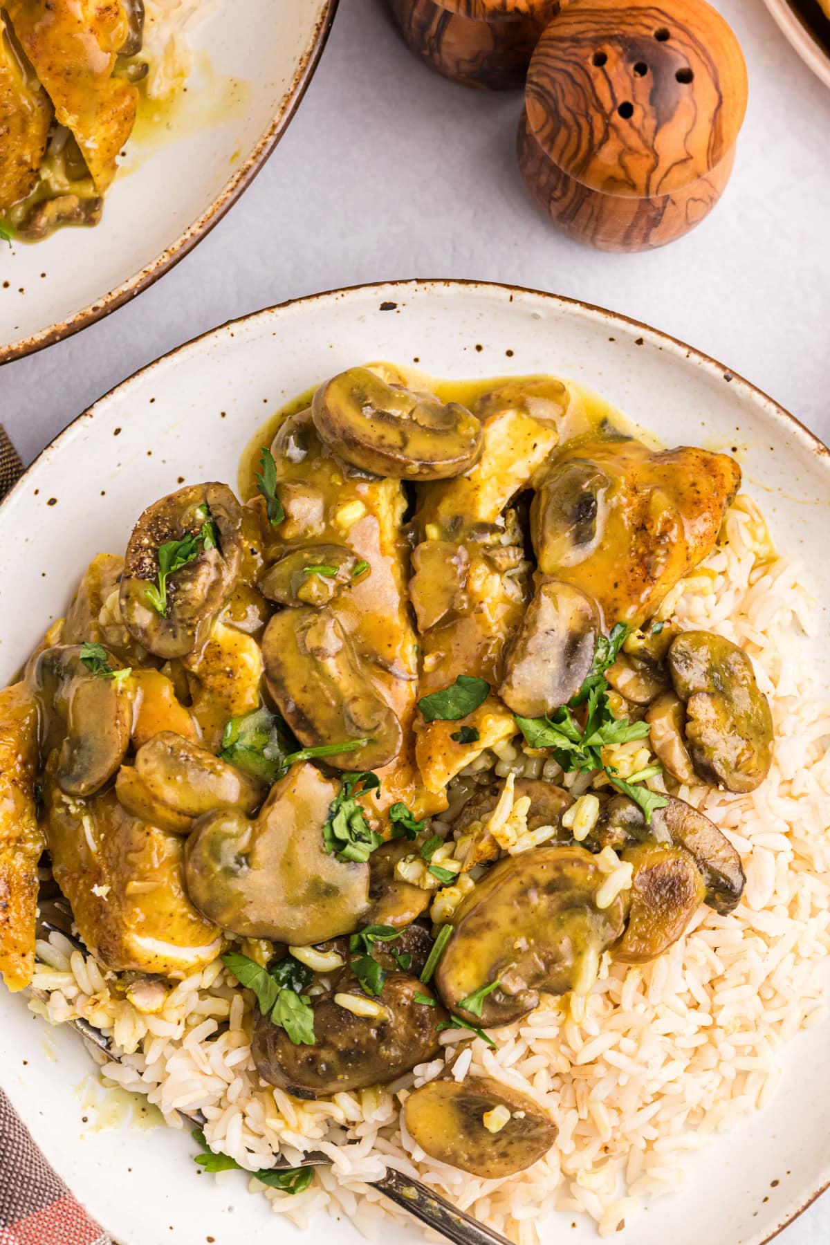 amaretto chicken on plate with rice