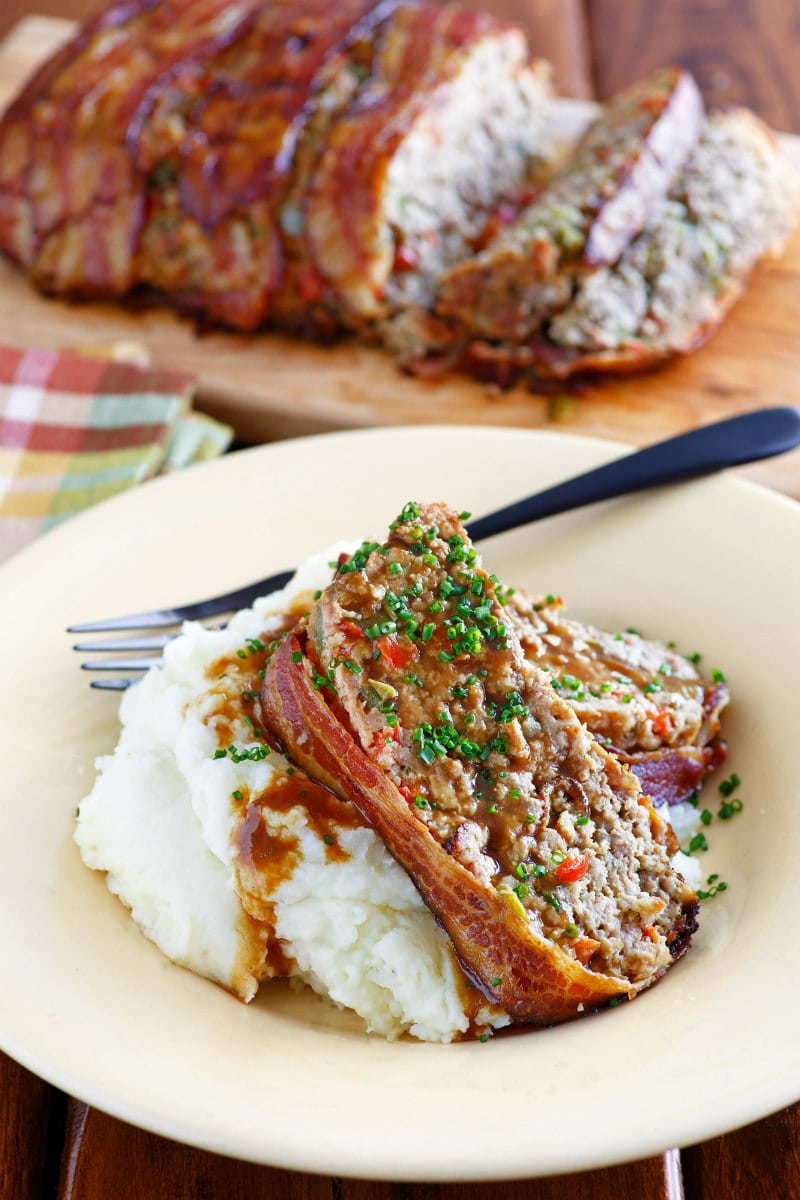 Bacon Wrapped Meatloaf recipe from RecipeGirl.com #bacon #wrapped #meatloaf #recipe #RecipeGirl Slice of Bacon Wrapped Meatloaf