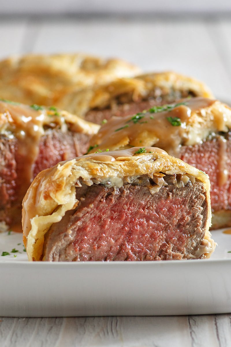 Beef Wellingtons with Gorgonzola and Madeira Wine Sauce recipe from RecipeGirl.com #beef #wellington #wellingtons #gorgonzola #madeira #wine #sauce #recipe #Recipegirl Beef Wellingtons