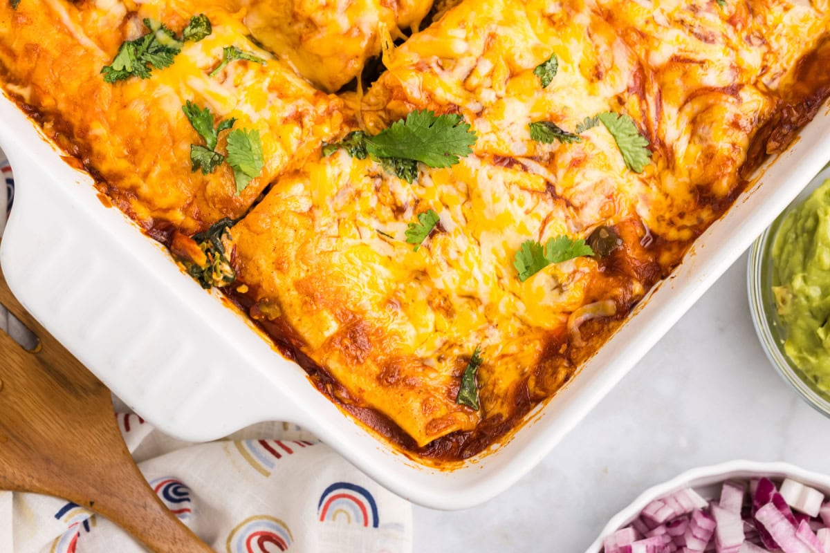 pan of chicken and spinach enchiladas