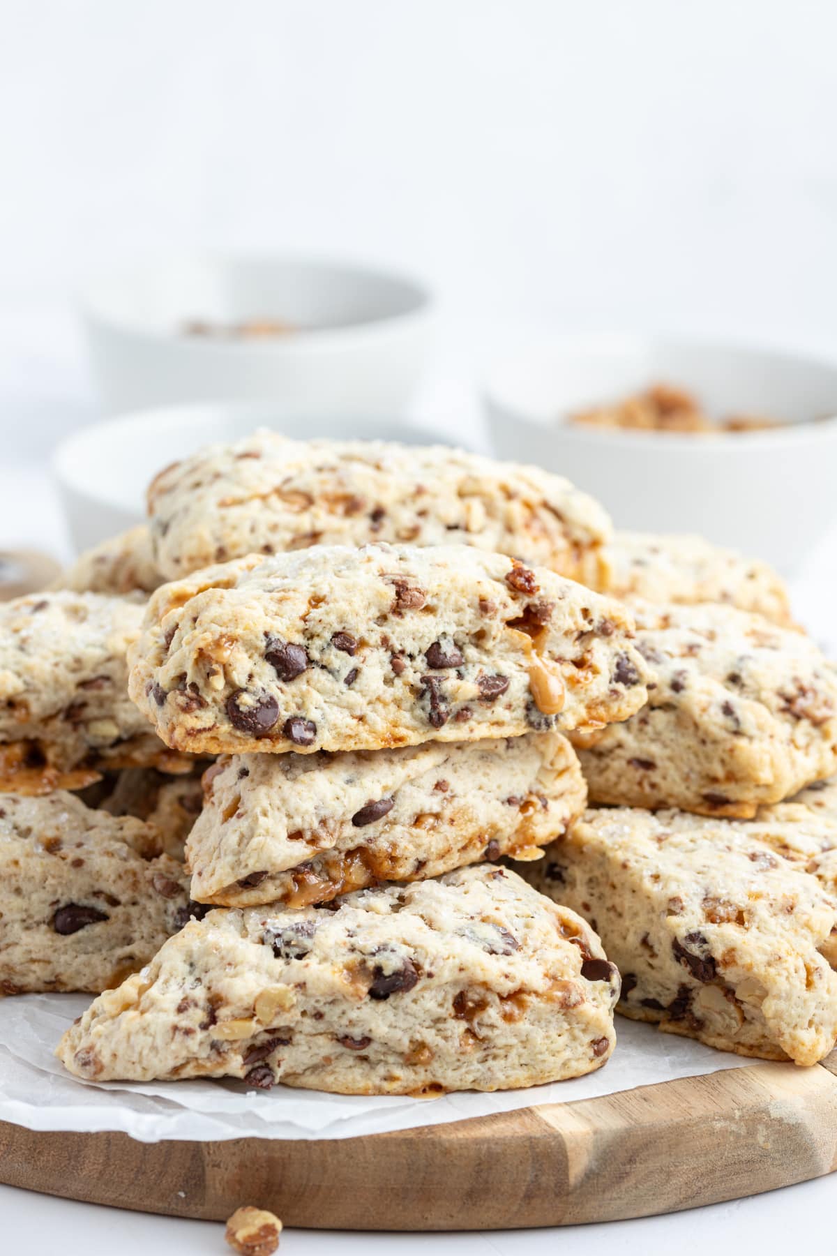Chocolate Chip Toffee Scones recipe from RecipeGirl.com chocolate chip toffee scones stacked on a plate
