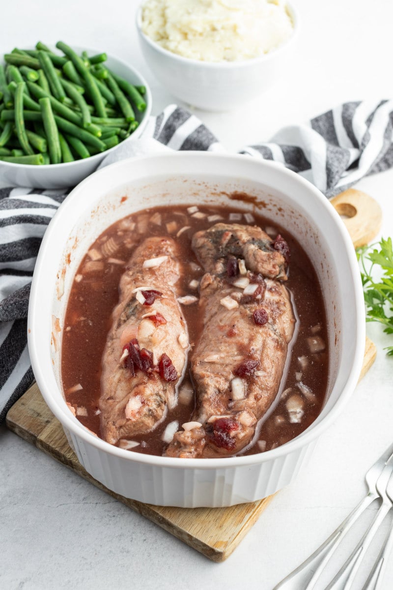 cranberry pork tenderloin cooked and in casserole dish