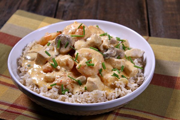 Deluxe Chicken and Shrimp recipe from RecipeGirl.com #chicken #shrimp #comfortfood #RecipeGirl Deluxe Chicken and Shrimp in bowl
