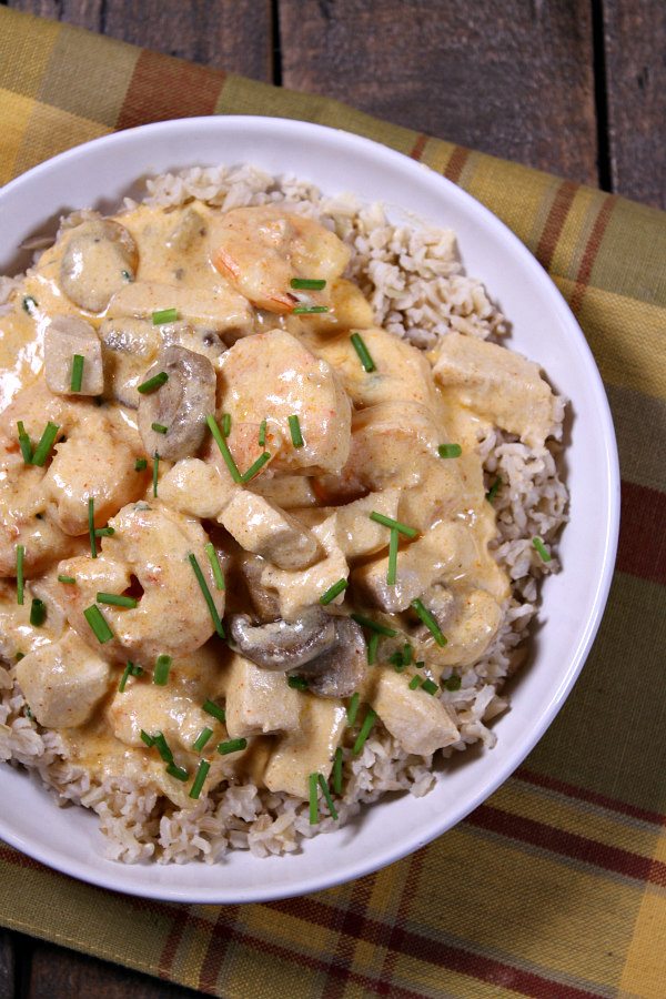 Deluxe Chicken and Shrimp recipe from RecipeGirl.com #chicken #shrimp #comfortfood #RecipeGirl Deluxe Chicken and Shrimp overhead shot in bowl