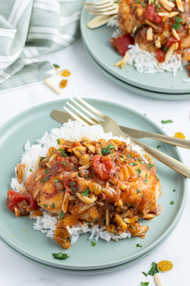 drunken chicken serving on plate over rice