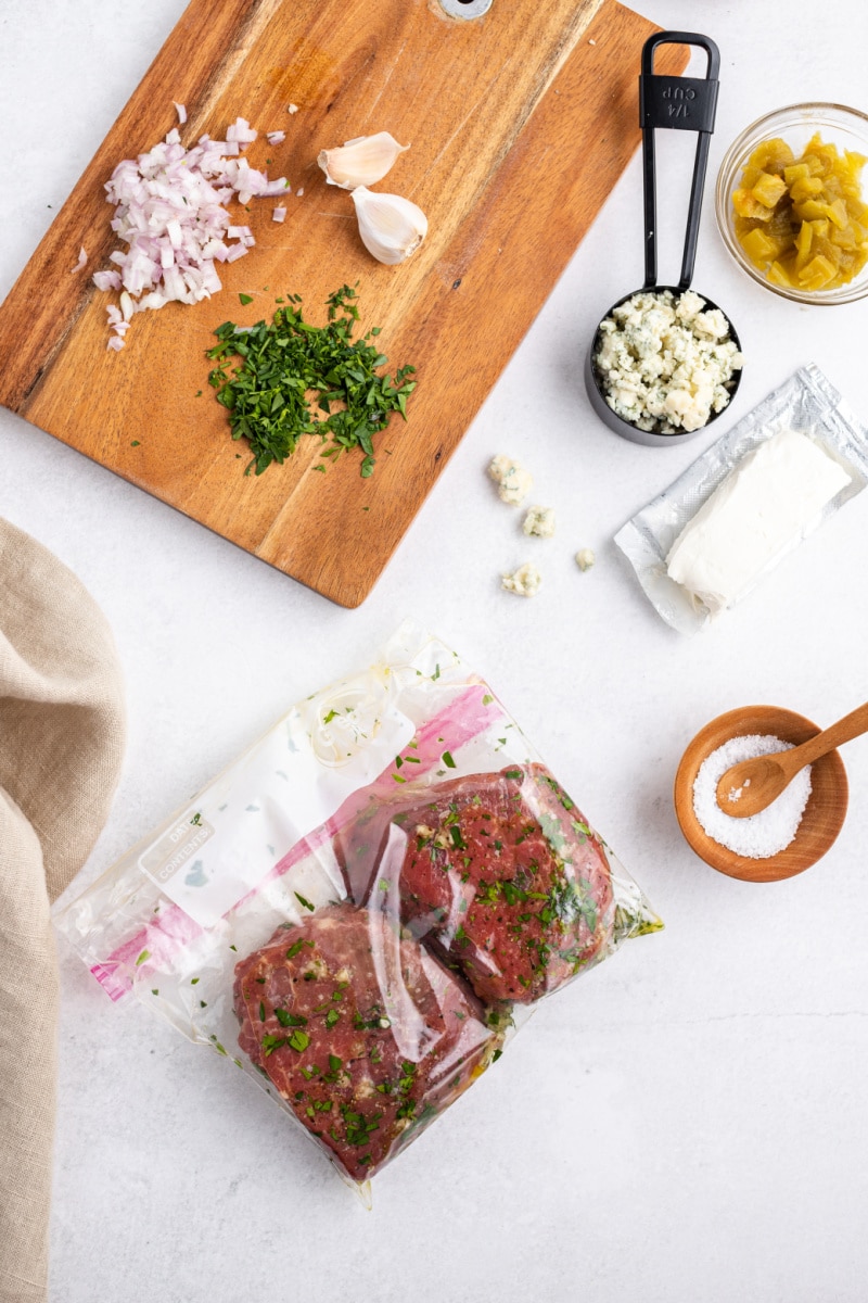 steaks marinating in a baggie