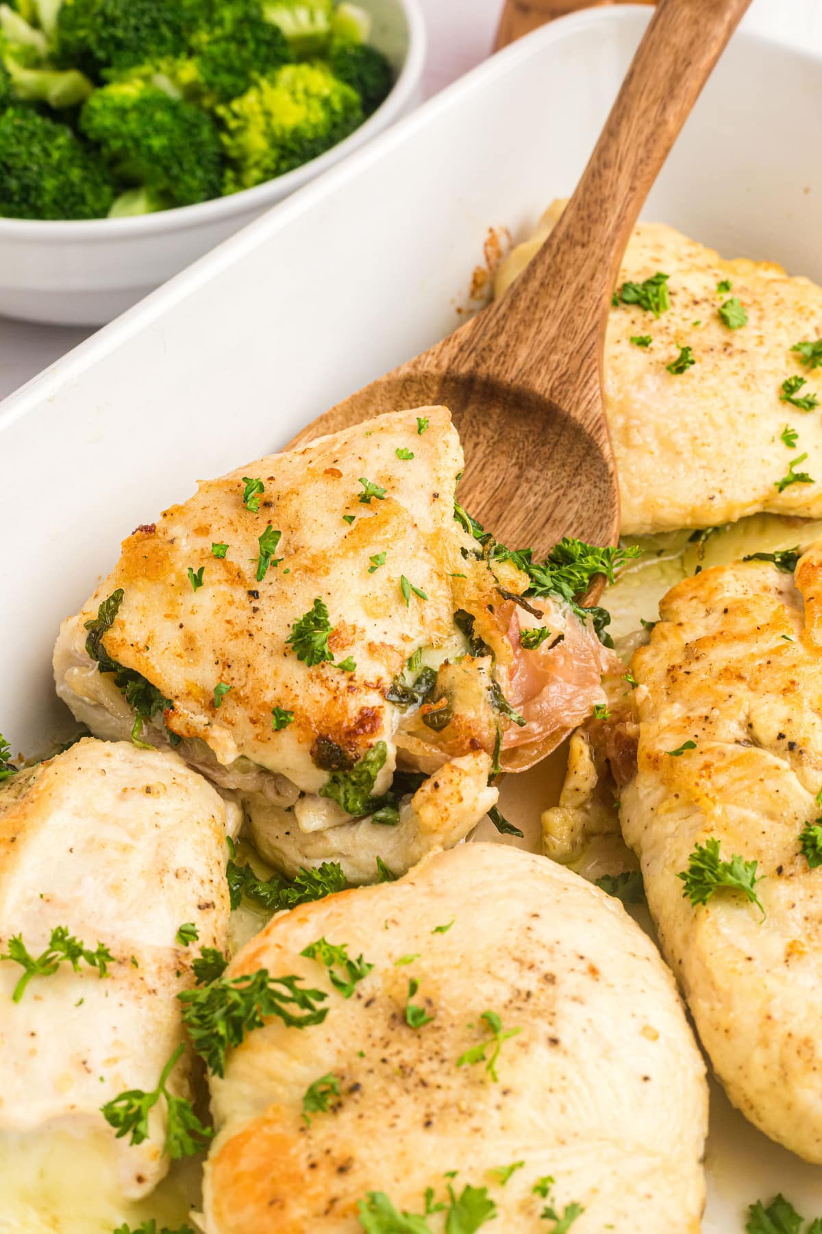 stuffed chicken breasts in casserole dish