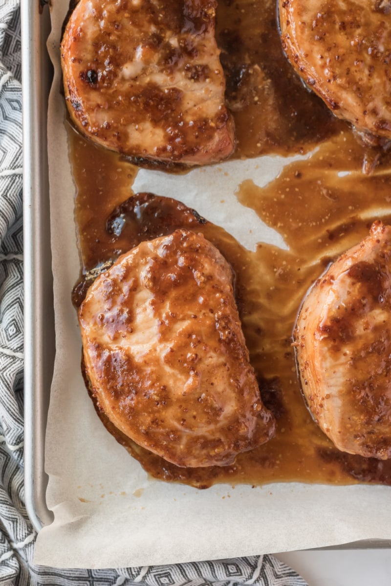 hoisin and honey glazed pork chops in a baking pan