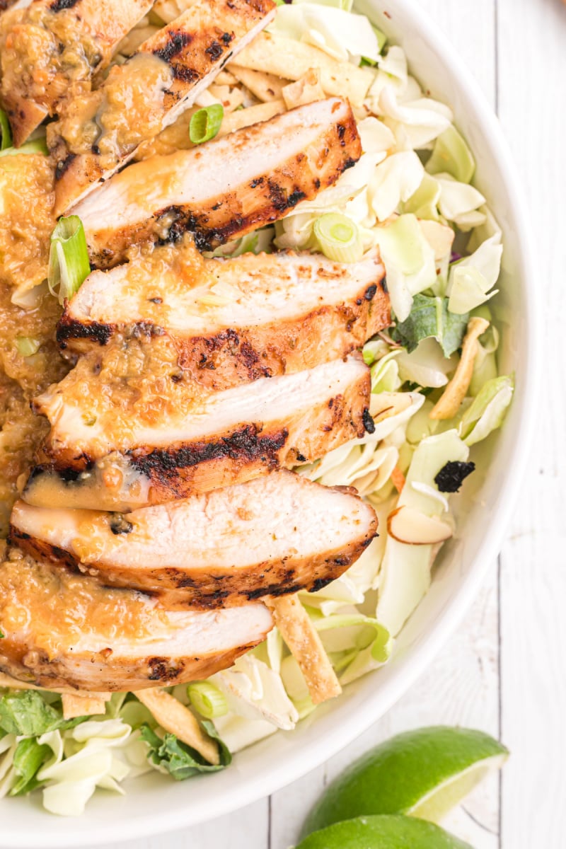 hoisin and lime marinated grilled chicken sliced and added to salad