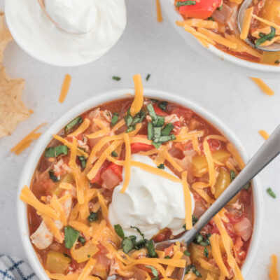 bowl of chicken chili with sour cream