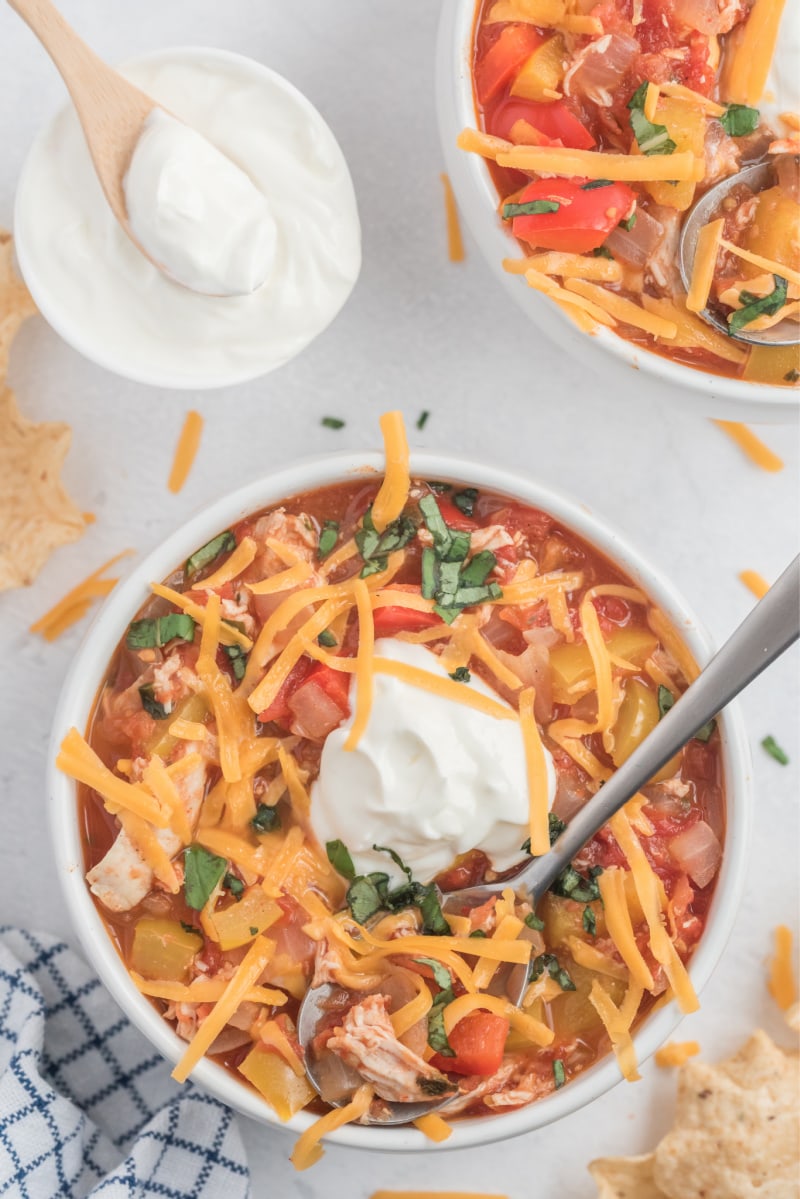 bowl of chicken chili with sour cream