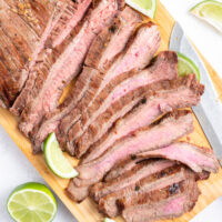 flank steak sliced on a board