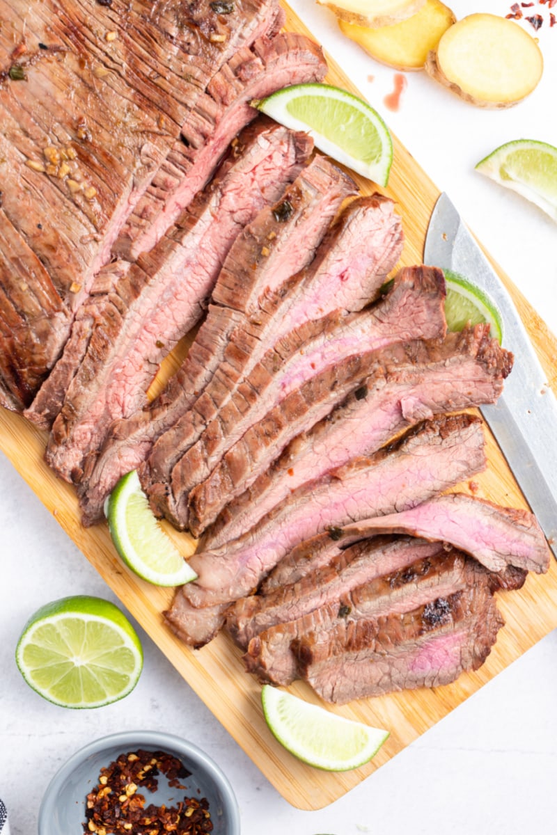 flank steak sliced on a board