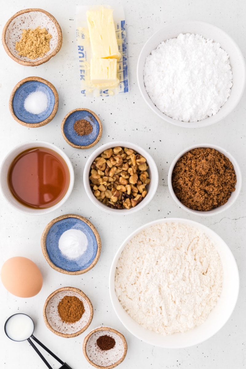 ingredients displayed for making maple walnut spice cookies