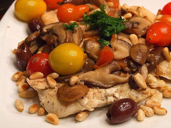 Mediterranean Chicken Mediterranean Chicken with tomato and olive topping