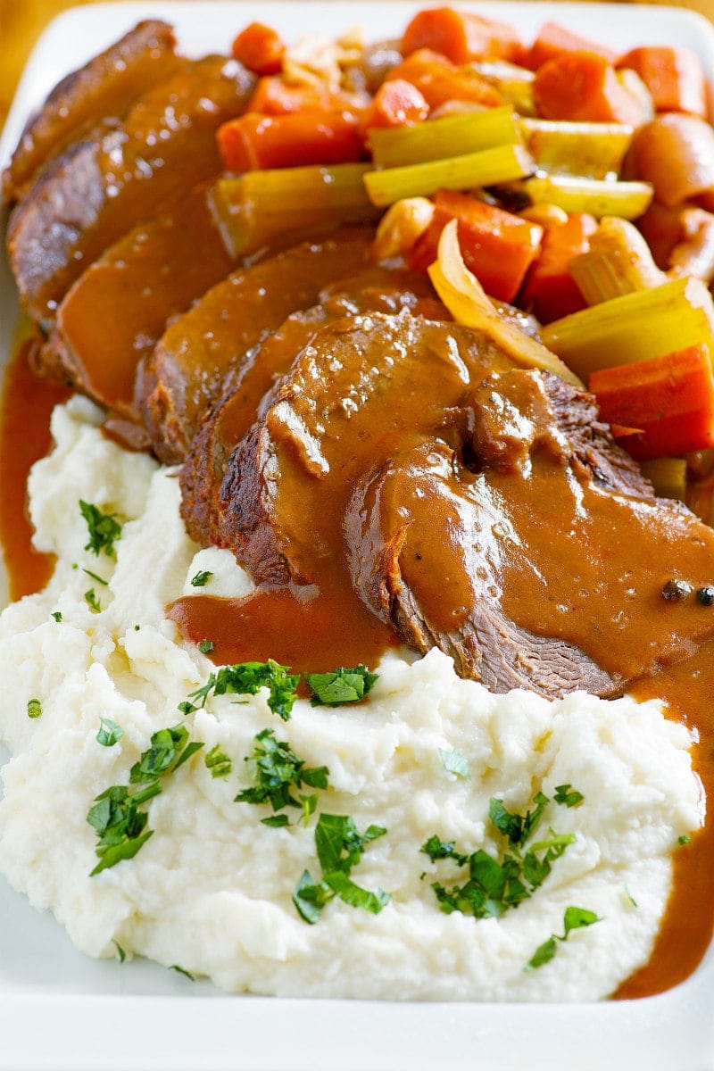 Merlot Pot Roast with sauce, vegetables and horseradish mashed potatoes