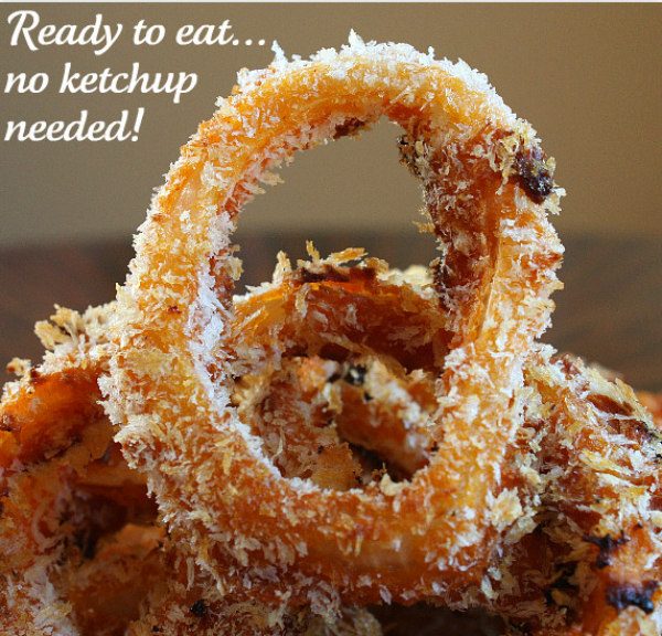 Baked BBQ Onion Rings - no dipping sauce needed because the barbecue sauce is baked right in! recipe from RecipeGirl.com #baked #bbq #barbecue #onionrings #recipe #RecipeGirl Baked BBQ Onion Rings