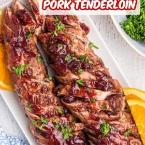 pinterest image for orange cranberry glazed pork tenderloin