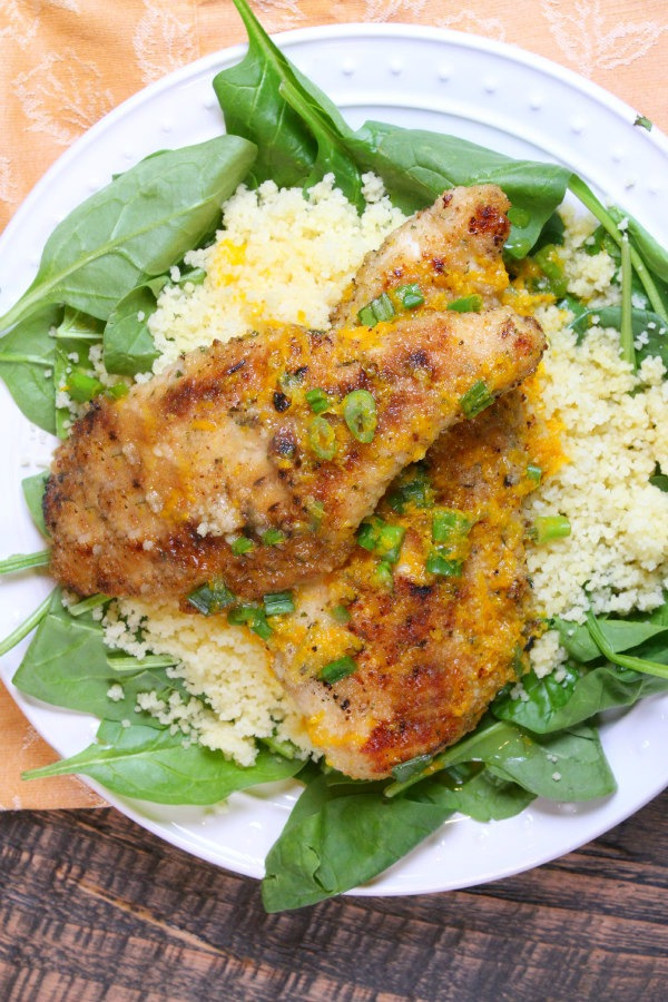 Orange Scallion Chicken on a bed of spinach and couscous