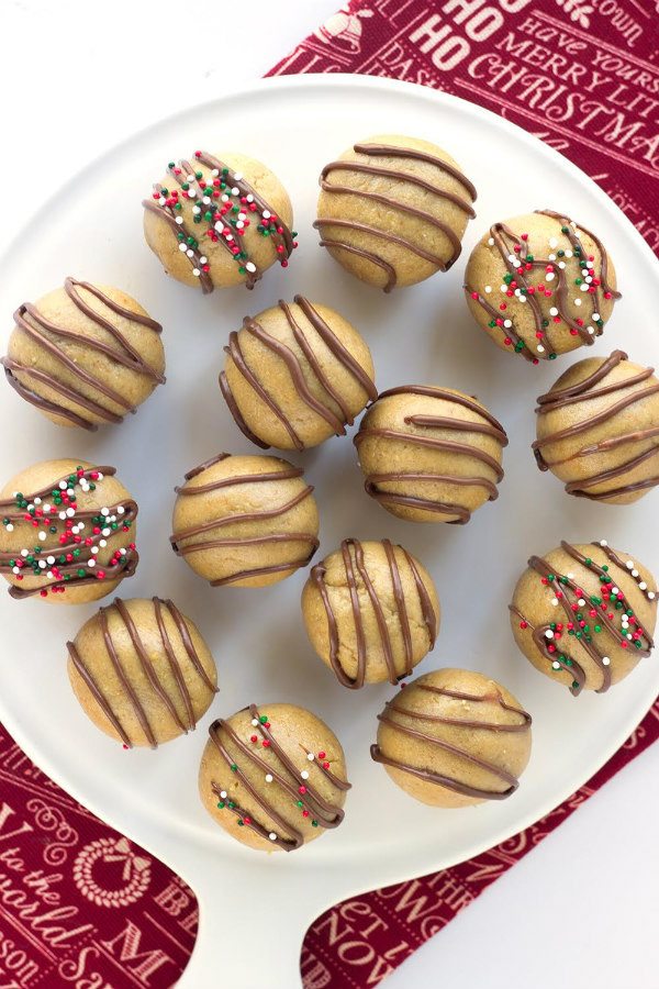 Easy No Bake Peanut Butter Balls drizzled with chocolate - from RecipeGirl.com