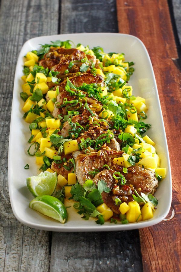 Pork Tenderloin with Mango Lime Salsa on a platter