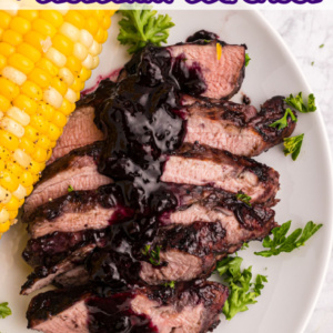 pinterest image for pork tenderloin with blueberry BBQ Sauce