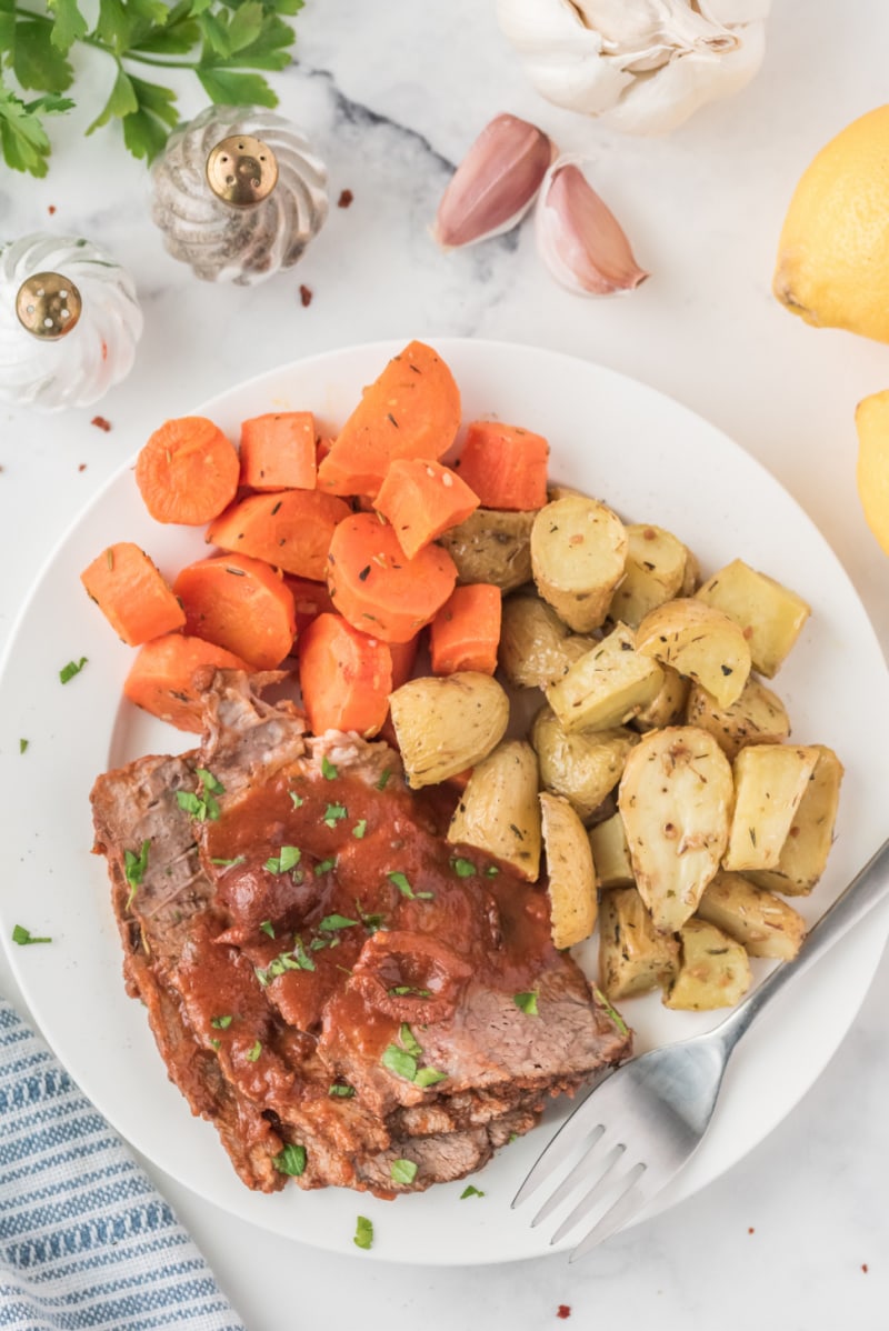 plate of pot roast with carrots and potatoes