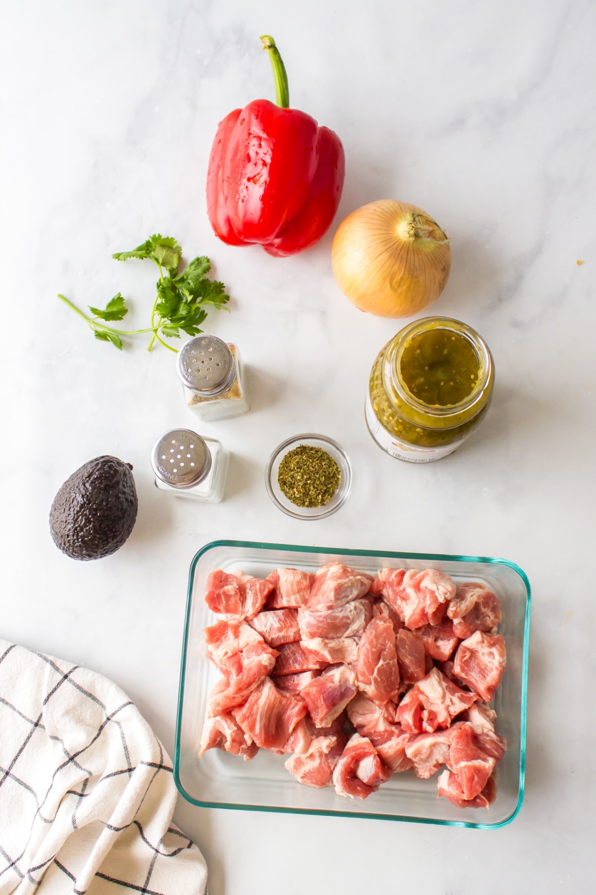 ingredients displayed for making slow cooked carnitas tacos