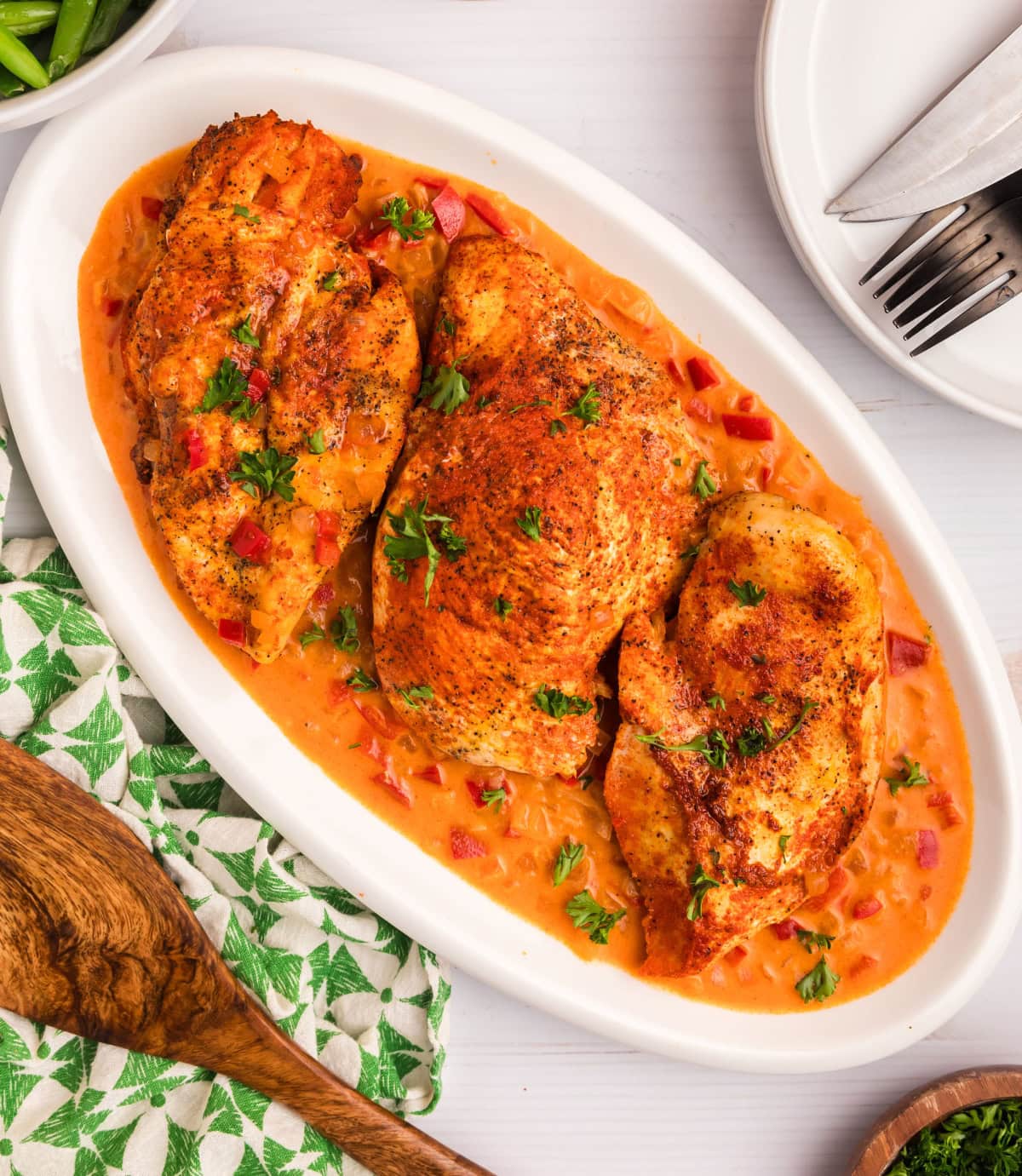 smothered chicken on a platter