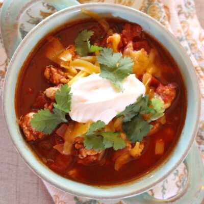 spicy turkey chili in a white bowl