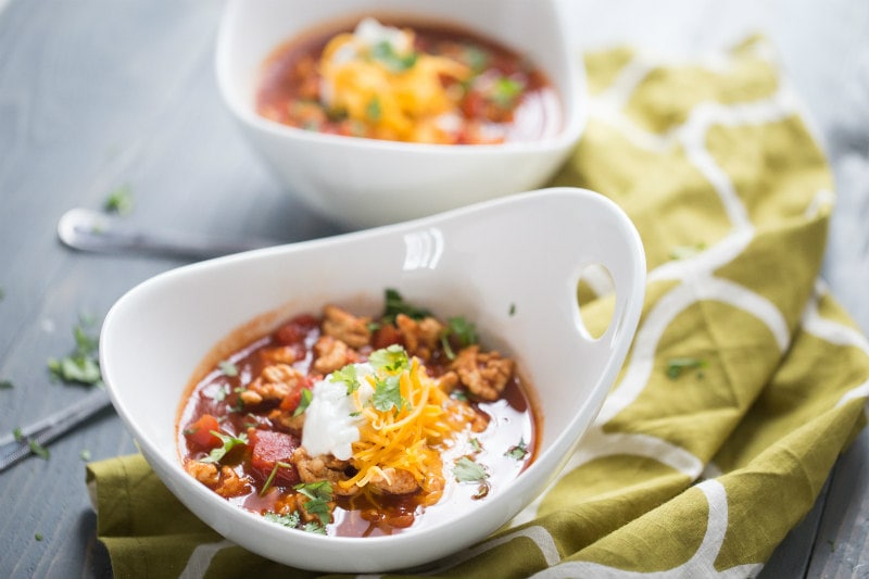 Spicy Turkey Chili recipe from RecipeGirl.com #spicy #healthy #turkey #chili #weight #watchers #weightwatchers #ww #wwfreestyle #recipe #RecipeGirl Bowls of Spicy Turkey Chili