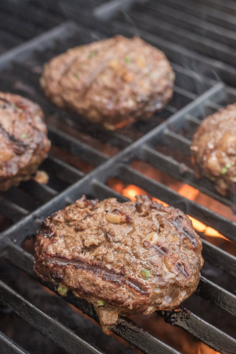 Teriyaki Burgers recipe from RecipeGirl.com #teriyaki #burger #burgers #recipe #RecipeGirl teriyaki burgers grilling on the barbecue