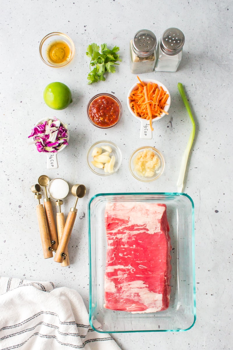 ingredients displayed for making thai beef tacos