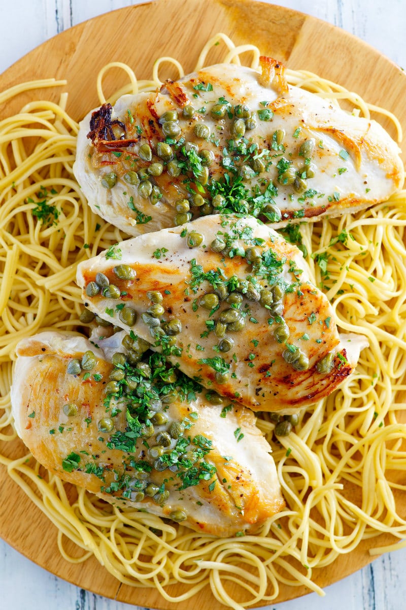 Chicken with Lemon Caper Sauce served over pasta