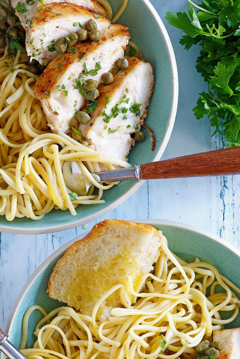 Chicken with Lemon Caper Sauce served over pasta