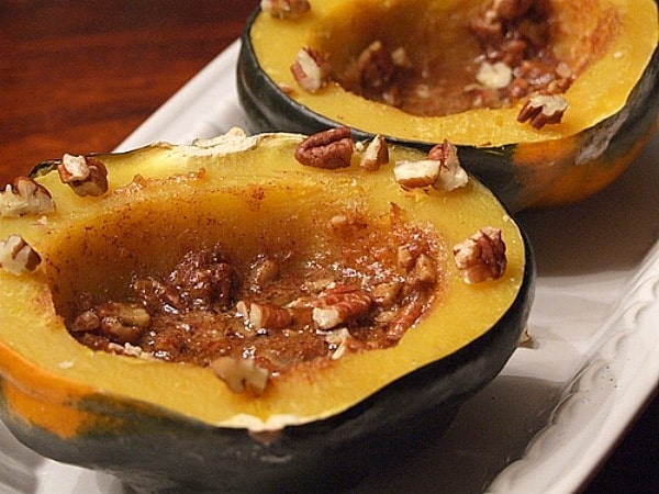 Acorn Squash Halves with Orange Pecans Acorn Squash with orange pecans cut open