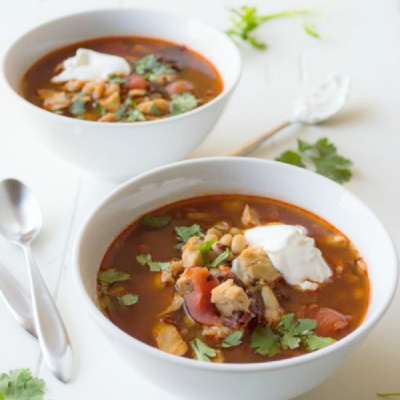 two bowls of chipotle chicken and tomato soup